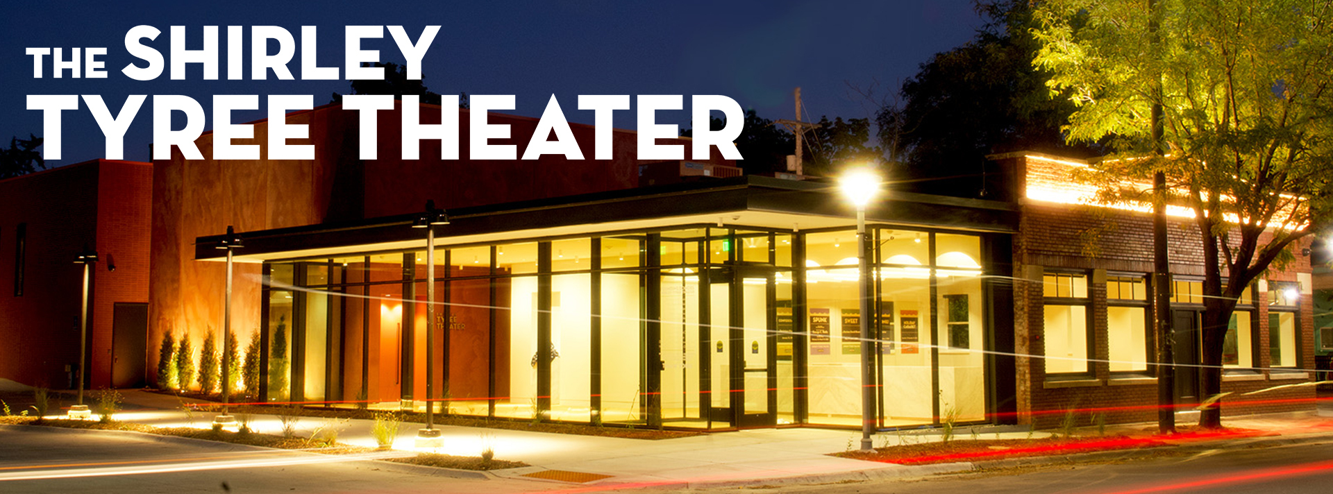 Banner The Shirley Tyree Theater seen at night