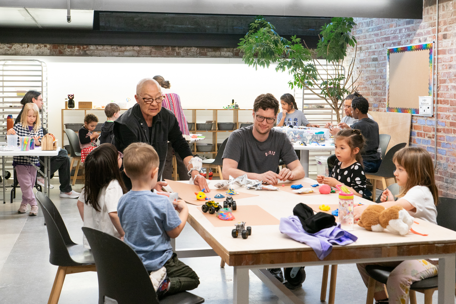 Families explore art stations at Family Night in the Youth Studios 2