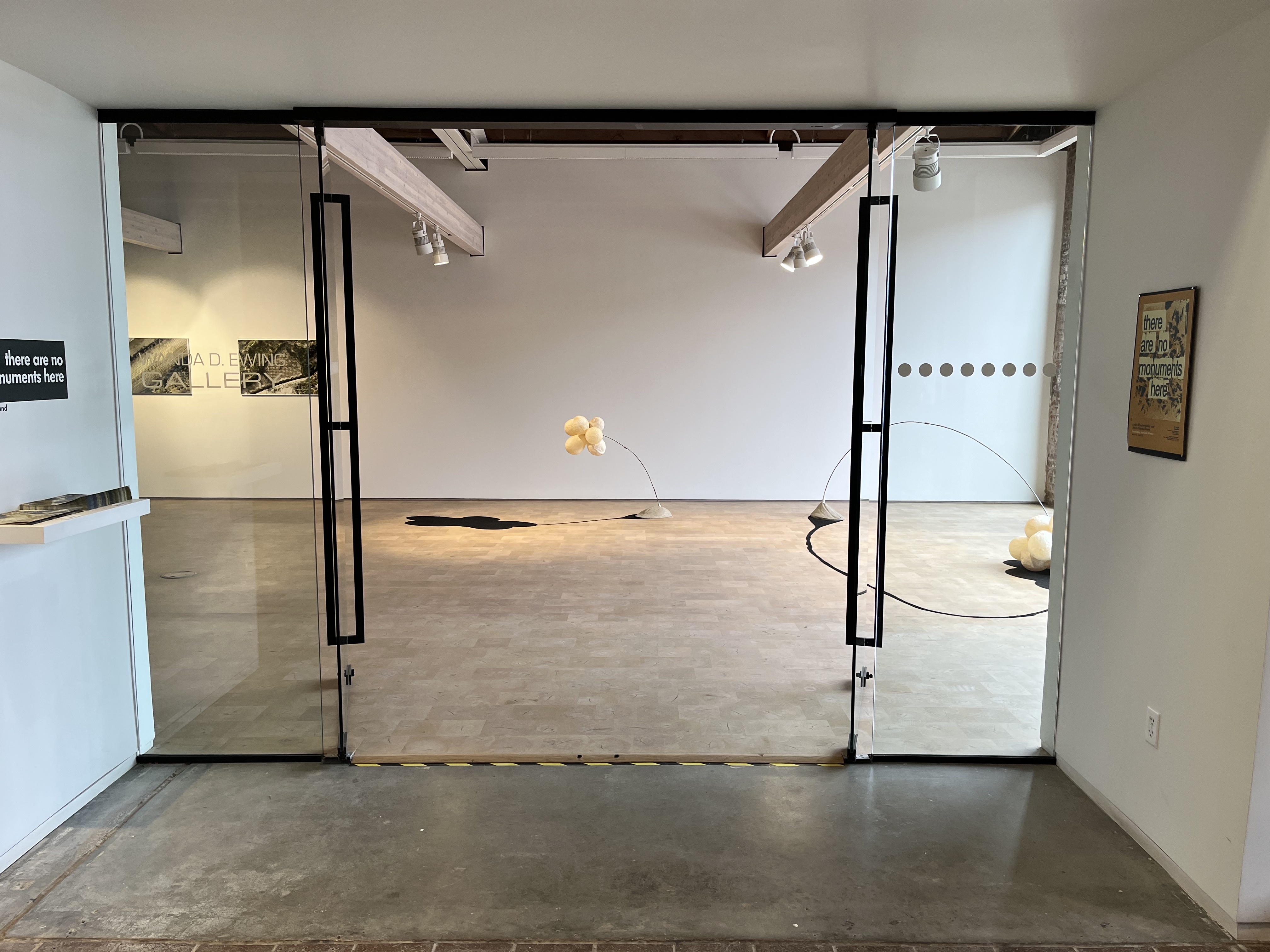 Photo of the open glass doors leading to the Wanda D Ewing Gallery