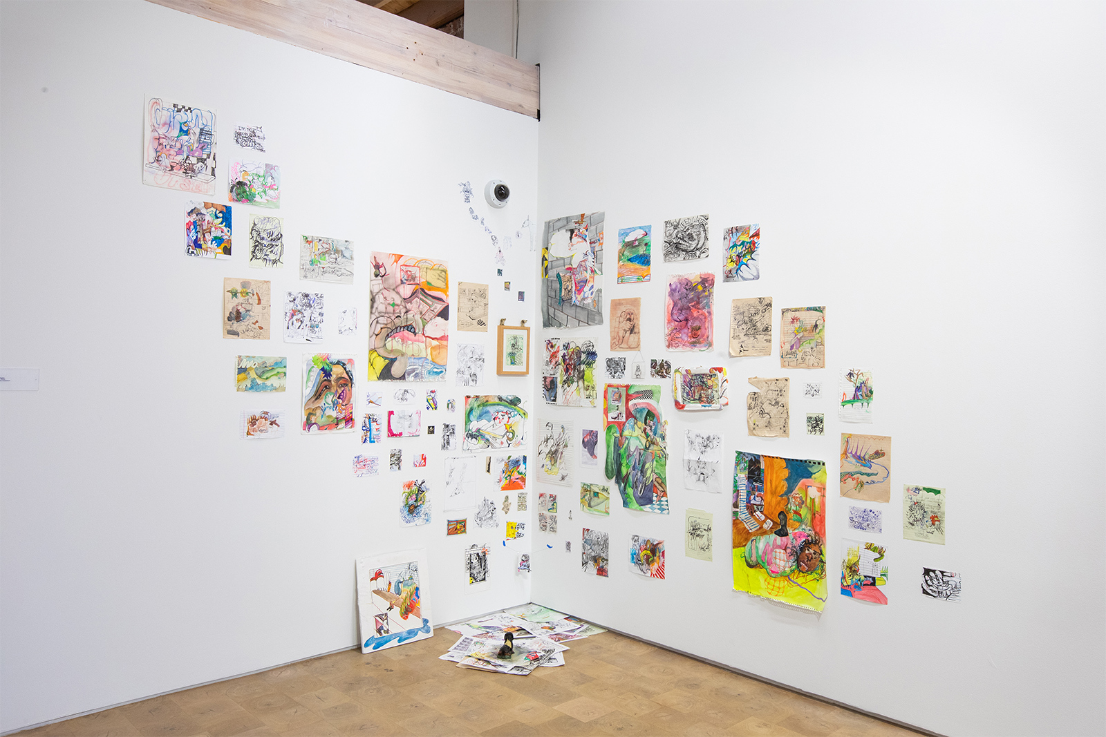 Thalia Rodgers - Several small works assembled in a corner of the gallery. Work is on paper and notebook pages. Paint, colored pencil, watercolor, and pen are the mediums. All are abstract, playful, colorful.