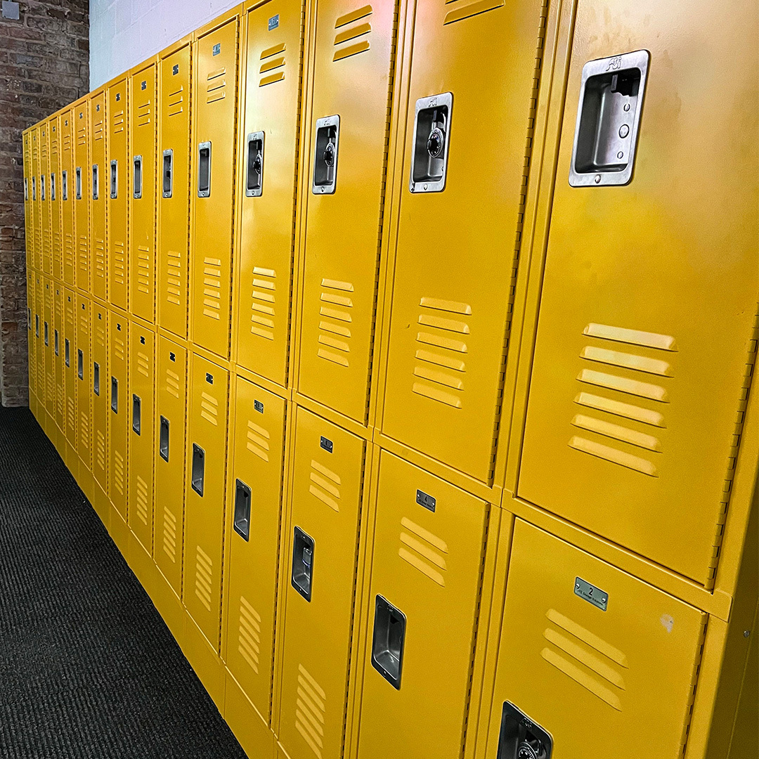 Yellow Co Op lockers lined up in a hallway